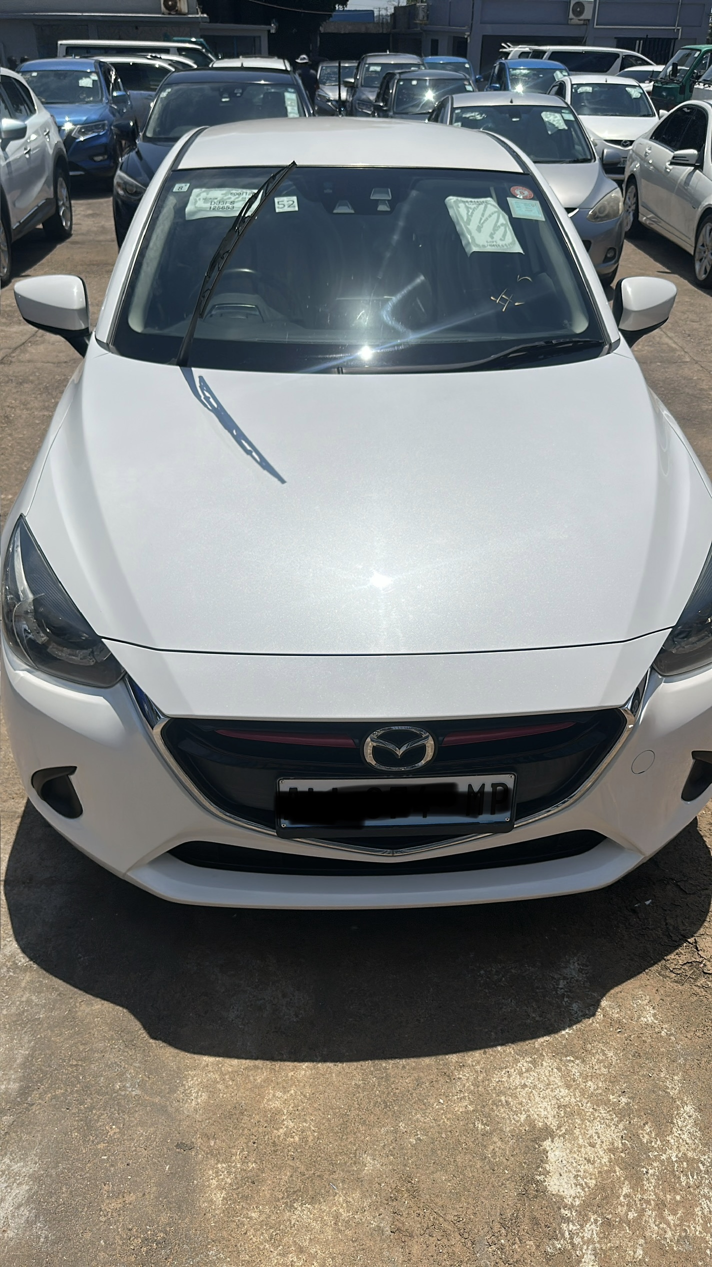 Mazda Demio Skyactiv – Branco Pérola | 570000 MZN | FRELIMO, Sommerschield, Maputo | MzDeal